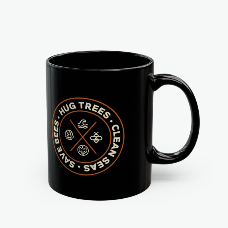Hug Trees Clean Seas Save Bees mug featuring circular conservation badge with tree, wave, and bee icons on black ceramic coffee mug