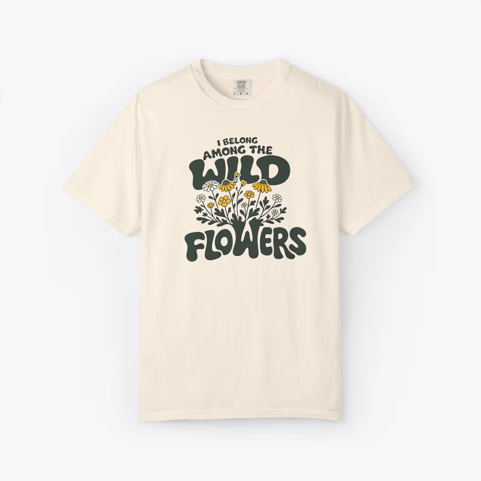 Among the Wildflowers unisex tee featuring retro lettering with hand drawn floral design in earthy tones for cottagecore aesthetic