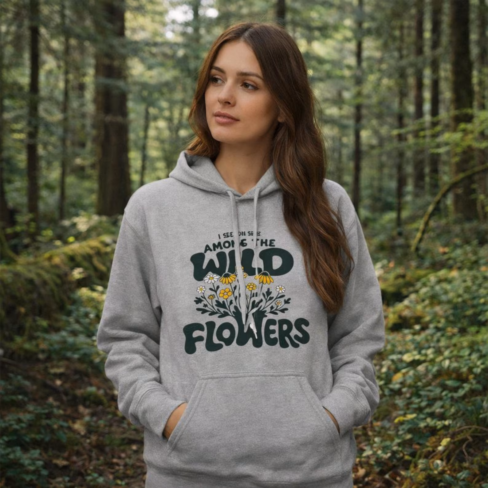 Among the Wildflowers lightweight hoodie featuring hand drawn floral design with earthy tones and nature inspired quote