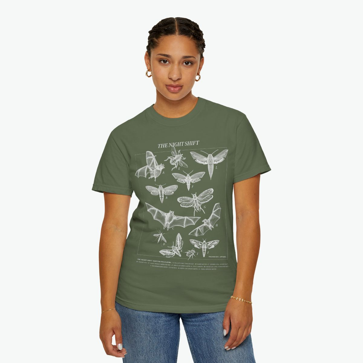 Night Shift unisex tee featuring bats, moths, and nocturnal pollinators in vintage scientific illustration style on black background